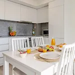 Modern & Sleek Flat | Terrace & Garage By Hostwise Apartmán